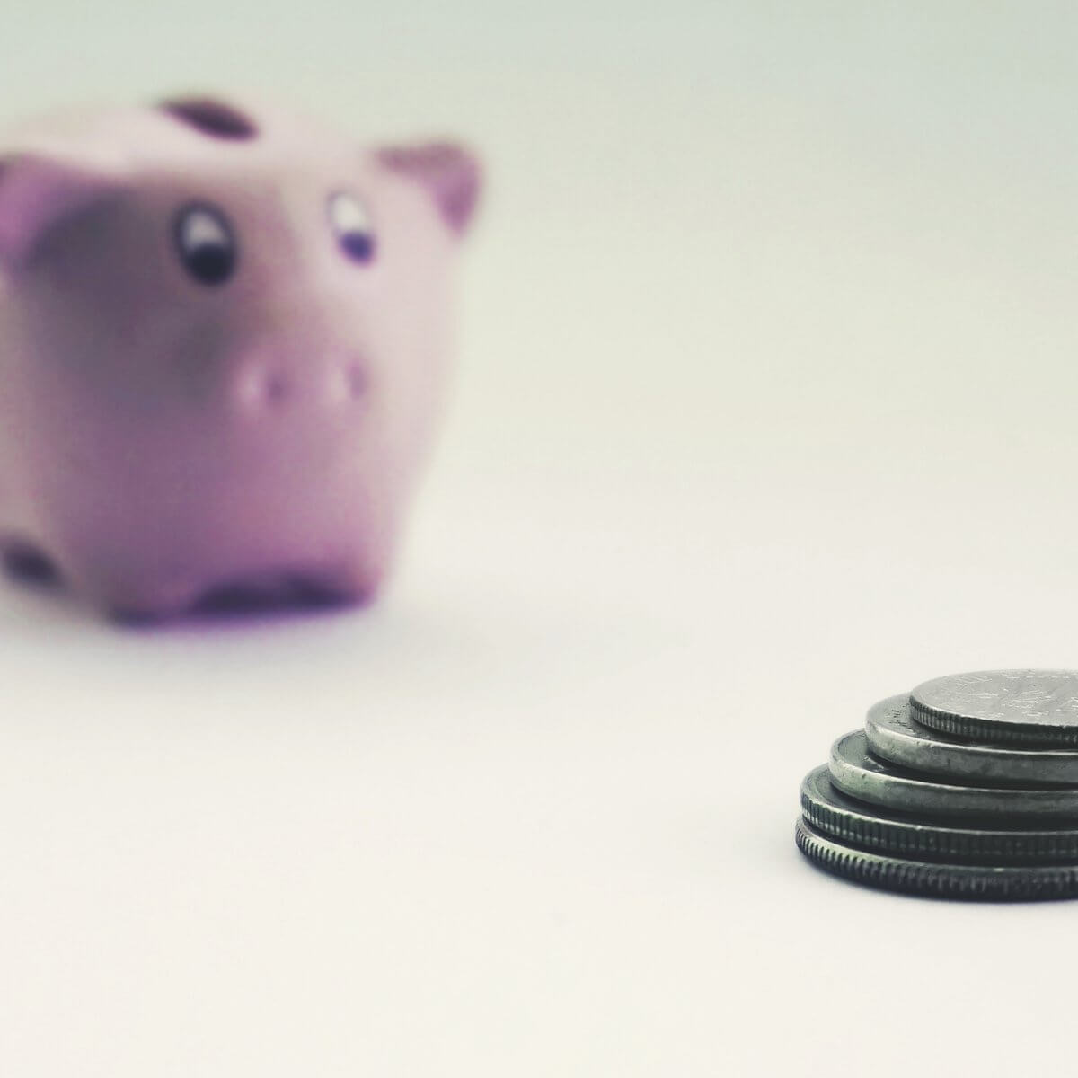 coins and a piggy bank 4056856